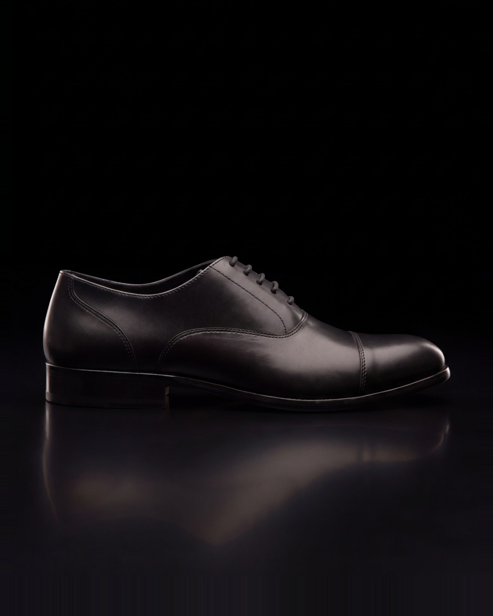 Adams, cap-toe oxford in black, side view