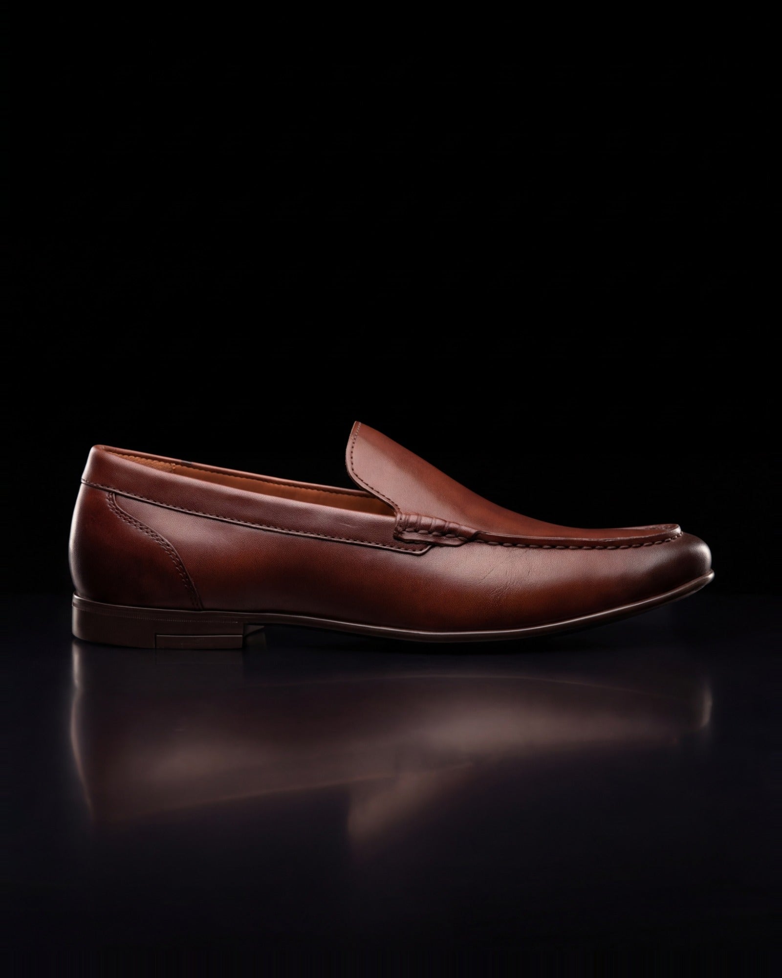 Ashton, moc-toe loafer in whiskey, side view