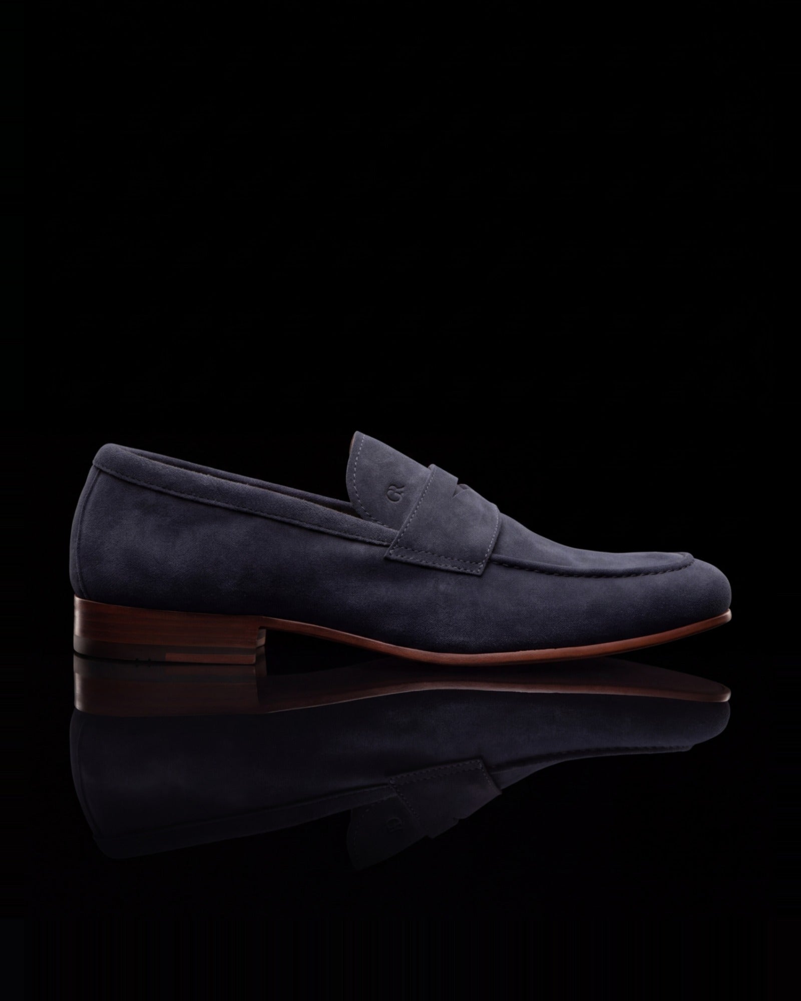 Cartwright, penny loafer in navy suede, side view