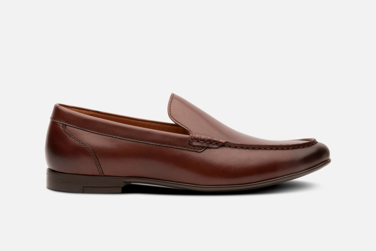 The Ashton moc-toe loafer in whiskey, side profile