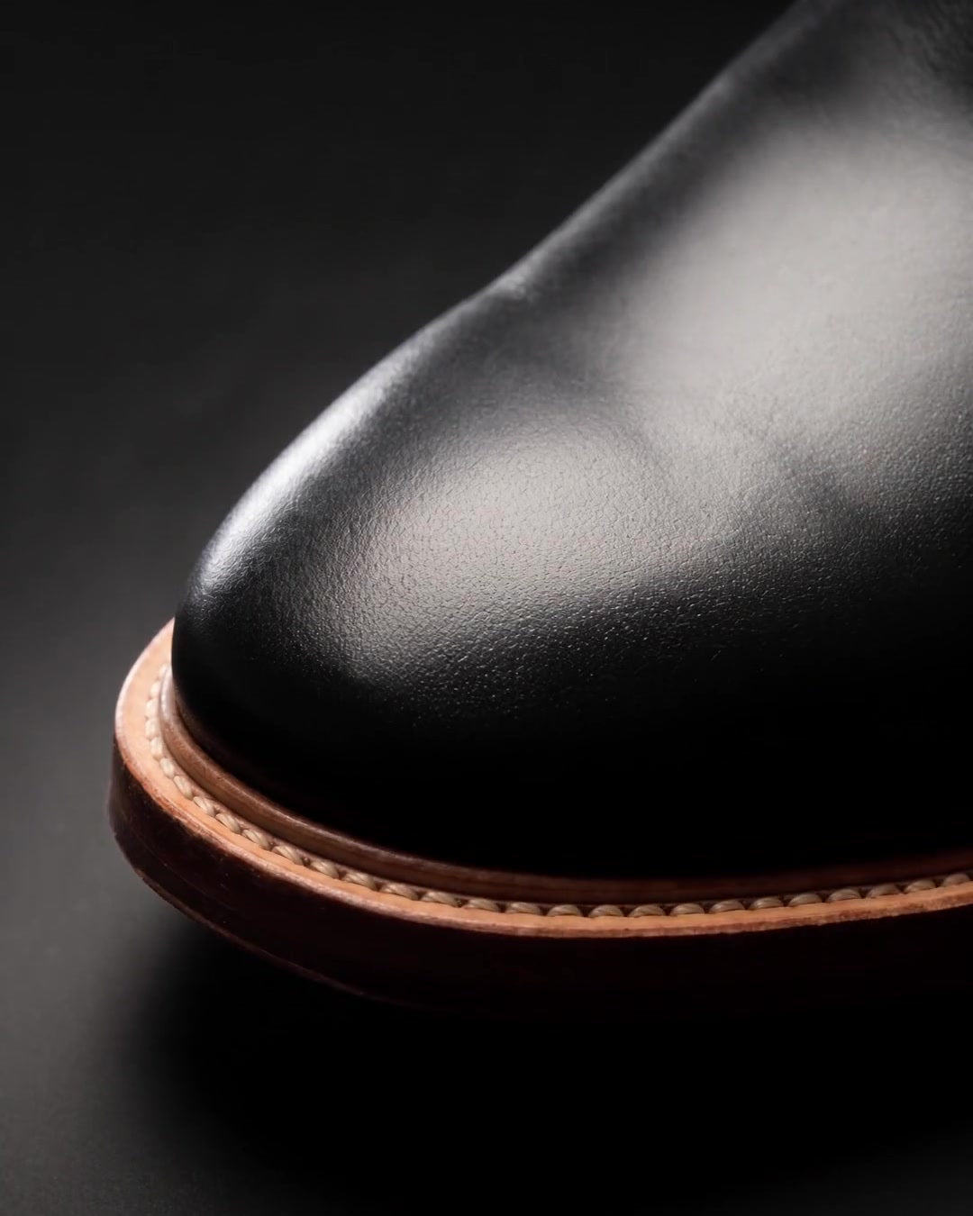 The toe of the Austin in black leather, with its stitched leather welt, close-up